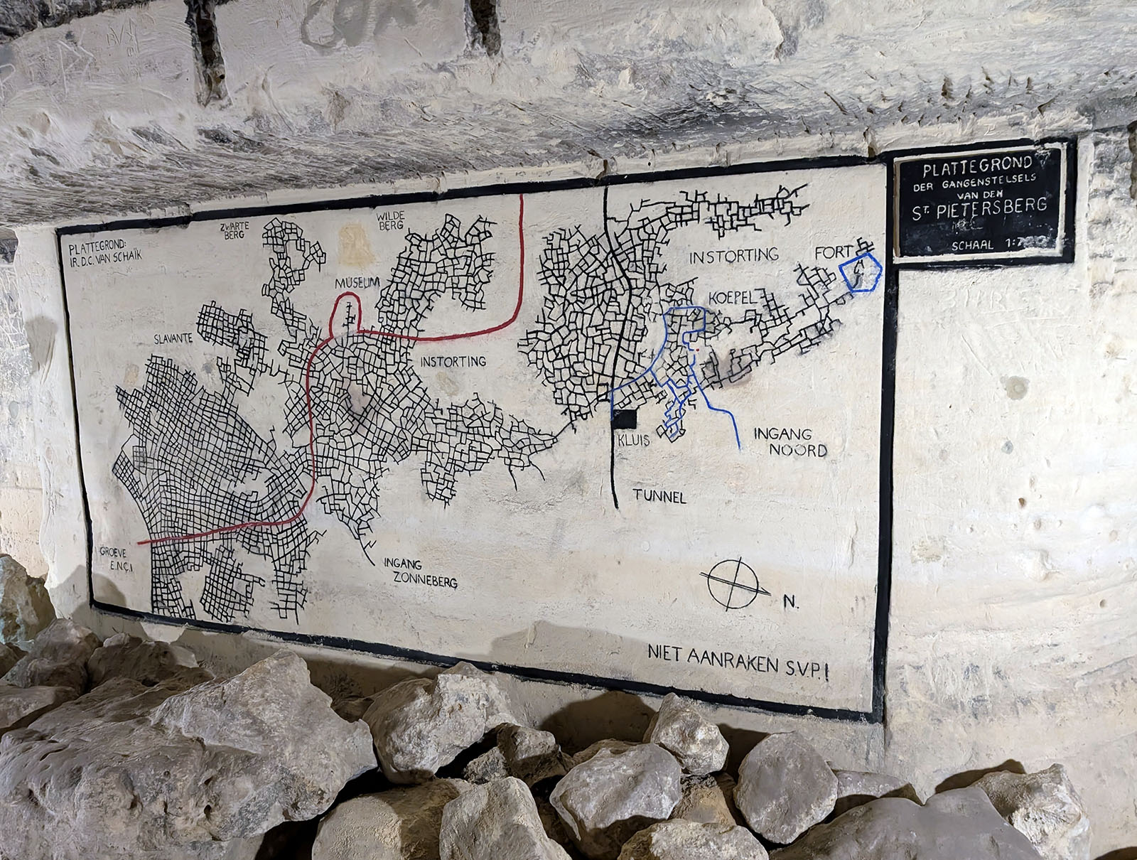 Map painted on an underground wall showing a huge maze of roughly right-angled tunnels
